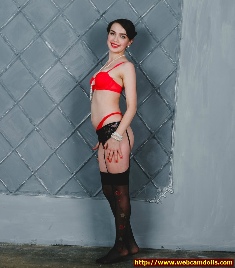 Brunette Girl wearing Black Patterned Stockings and Red Lingerie on Webcamdolls